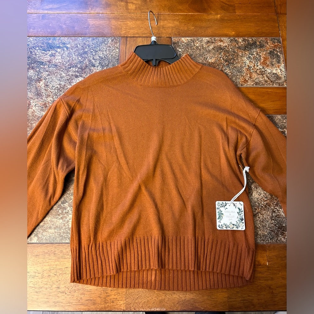 Brand new with tags Orange sweater size youth Large